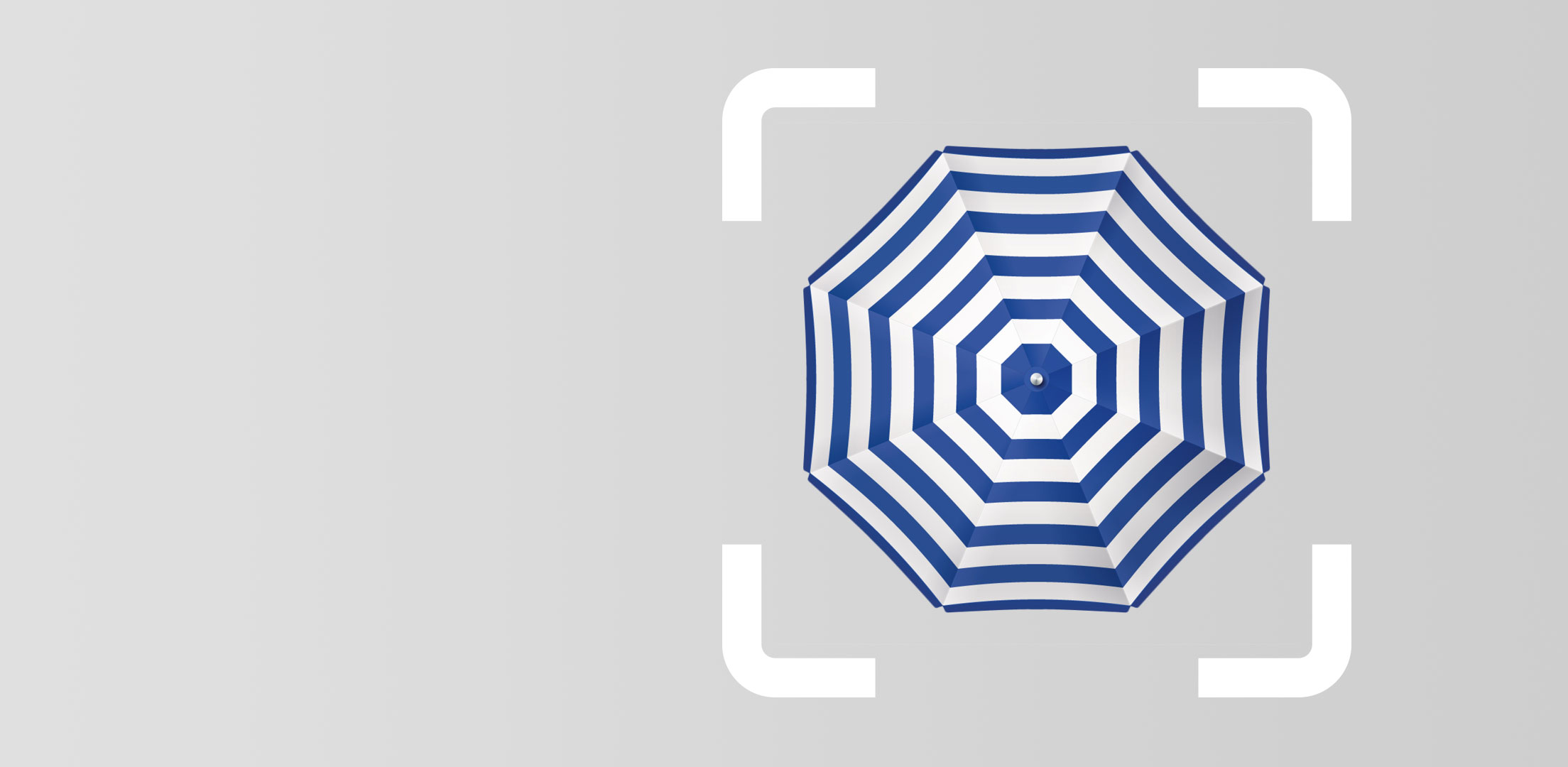 Umbrella White and blue striped umbrella from above