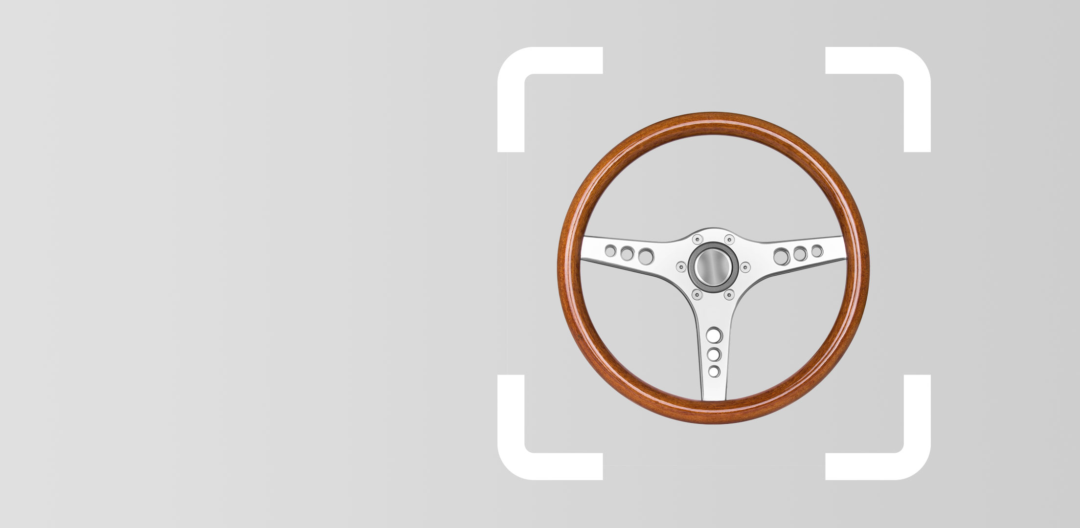 Old wooden sports car steering wheel